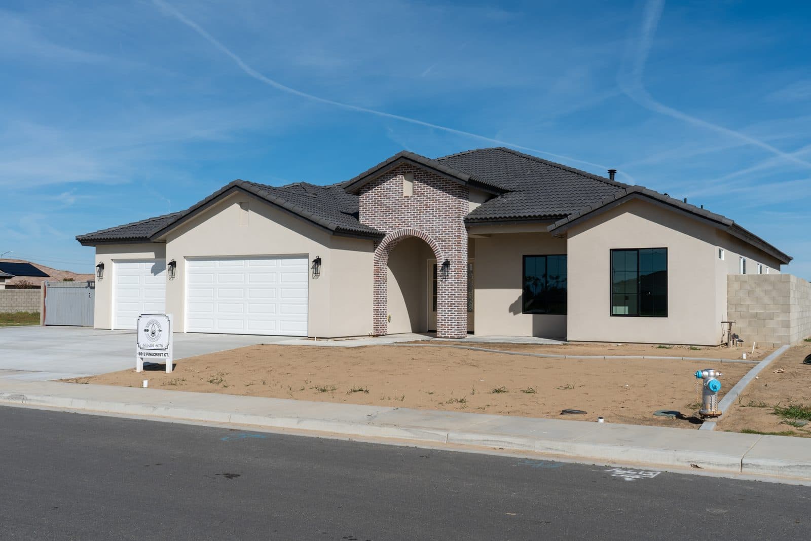 Completed new-construction home exterior by Intrepid Plastering, Bakersfield