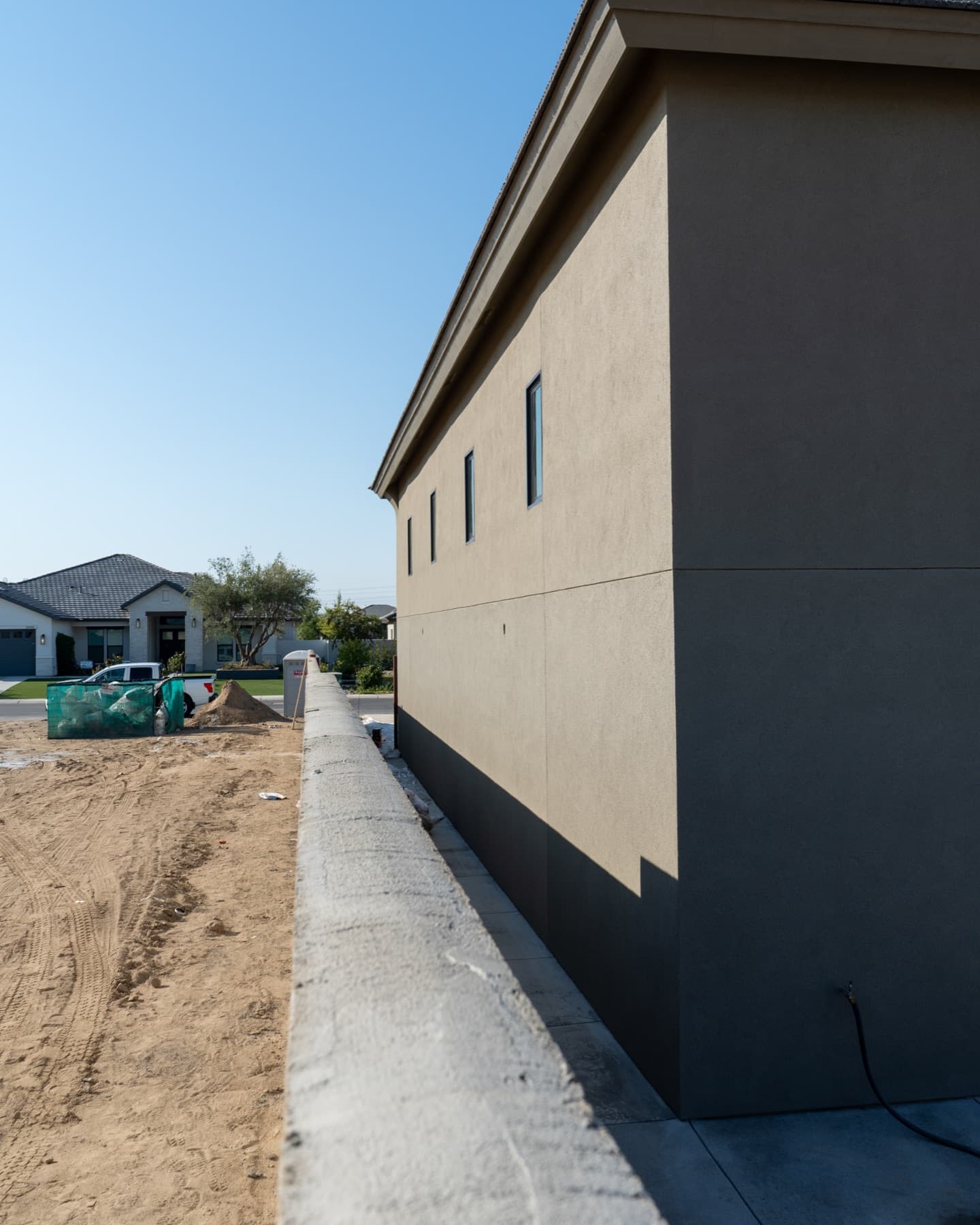 Exterior stucco wall finish by Intrepid Plastering, Bakersfield