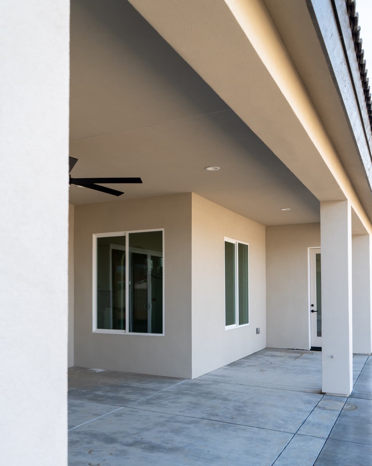 Outdoor living — finished covered patio and windows